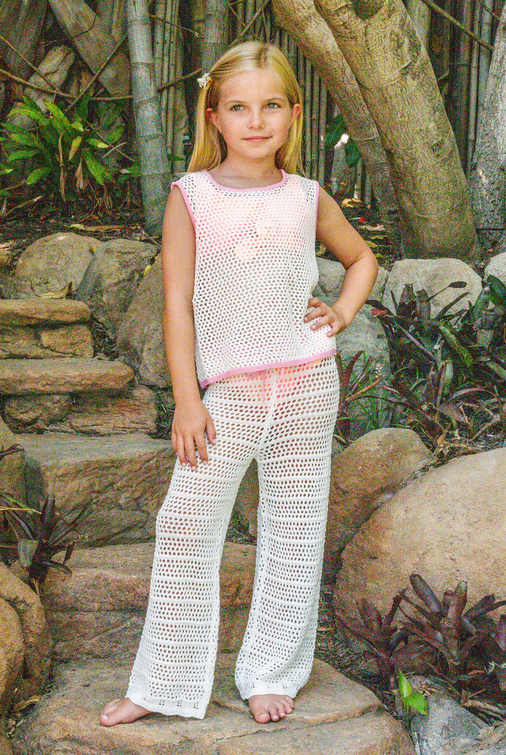 Kids White Chloe Set crochet outfit with pink accents and adjustable drawstring pants, perfect for sunny day adventures.