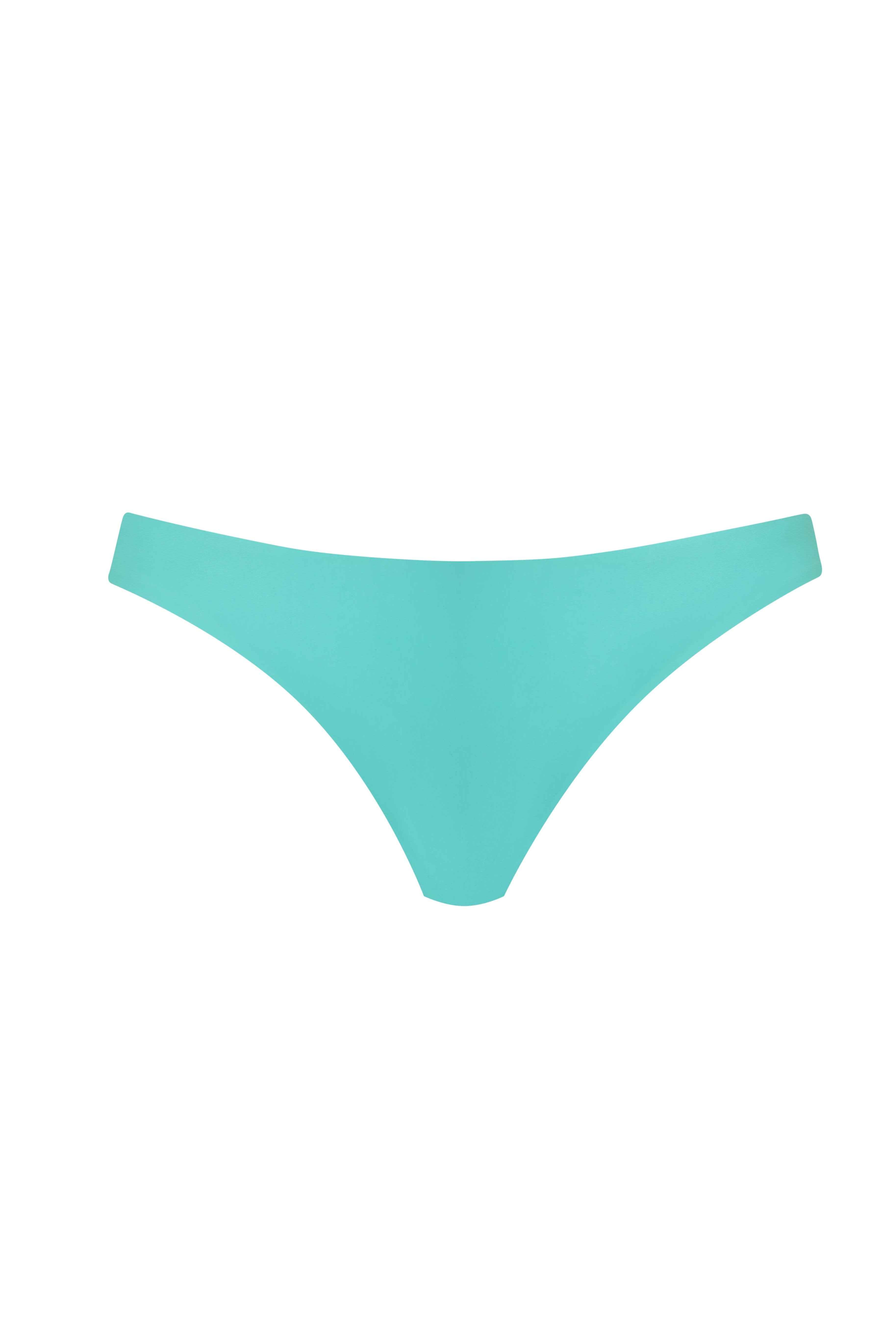A blue bikini bottom against a white wall background.