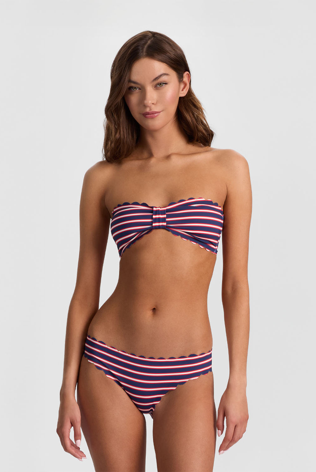 Teakwood Reversible Scalloped Bottom bikini with nautical stripes and red, scalloped trim.