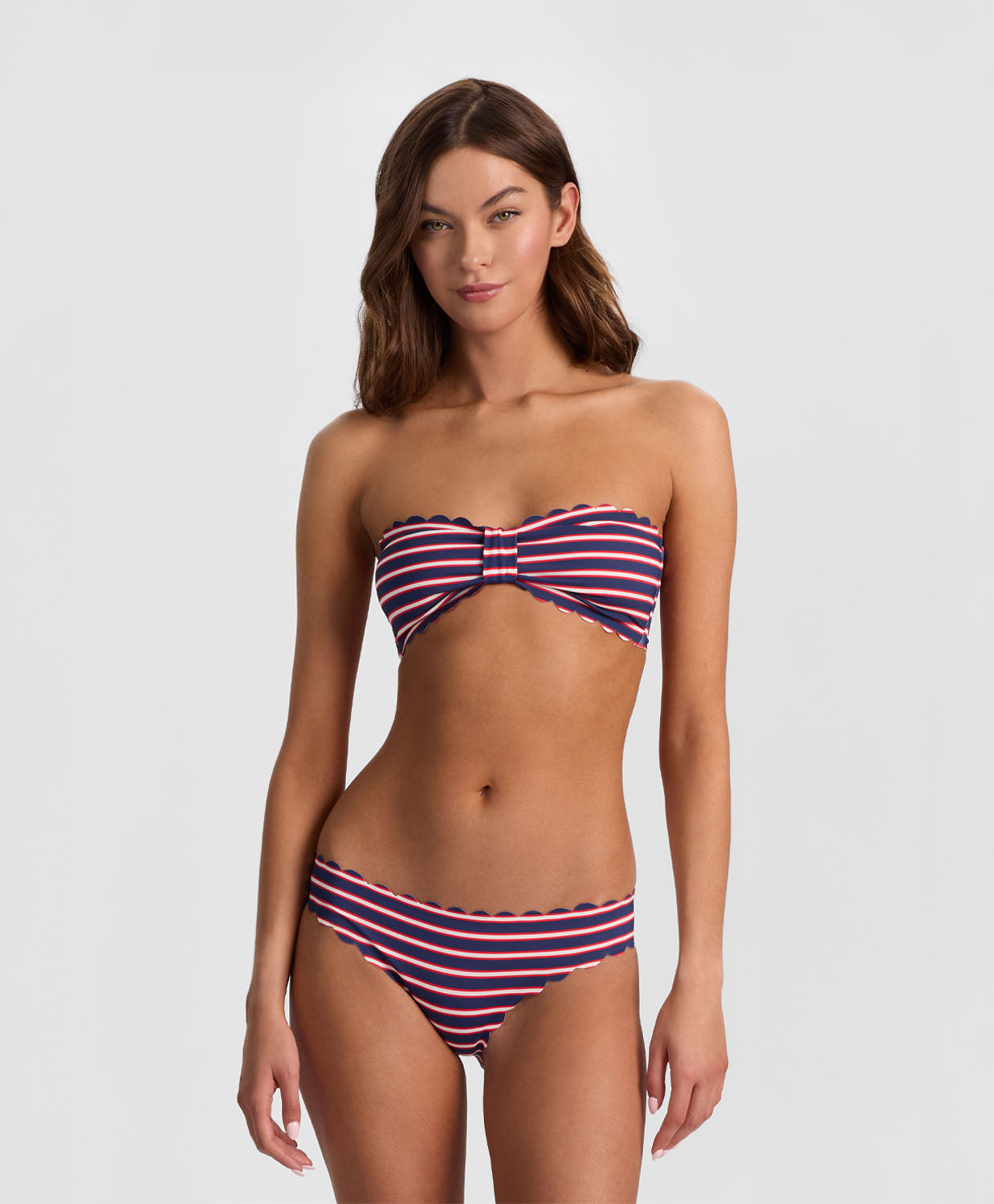 Teakwood Reversible Scalloped Bottom bikini with nautical stripes and red, scalloped trim.