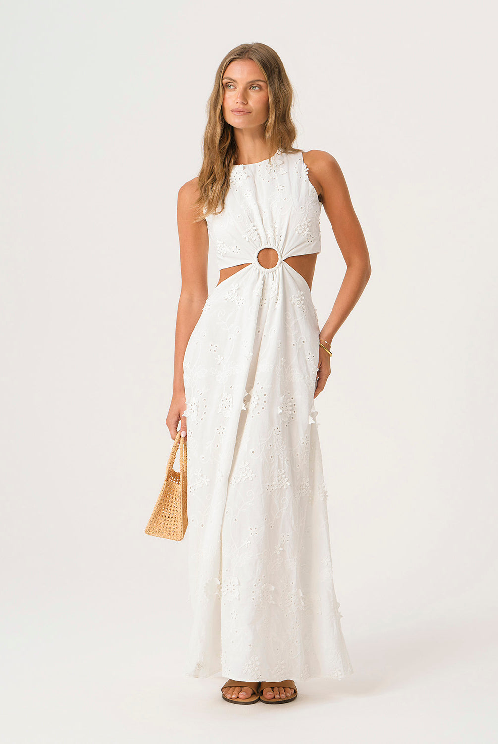 White Sands Tavi Dress in textured white eyelet fabric with center cutout and full-length feminine silhouette