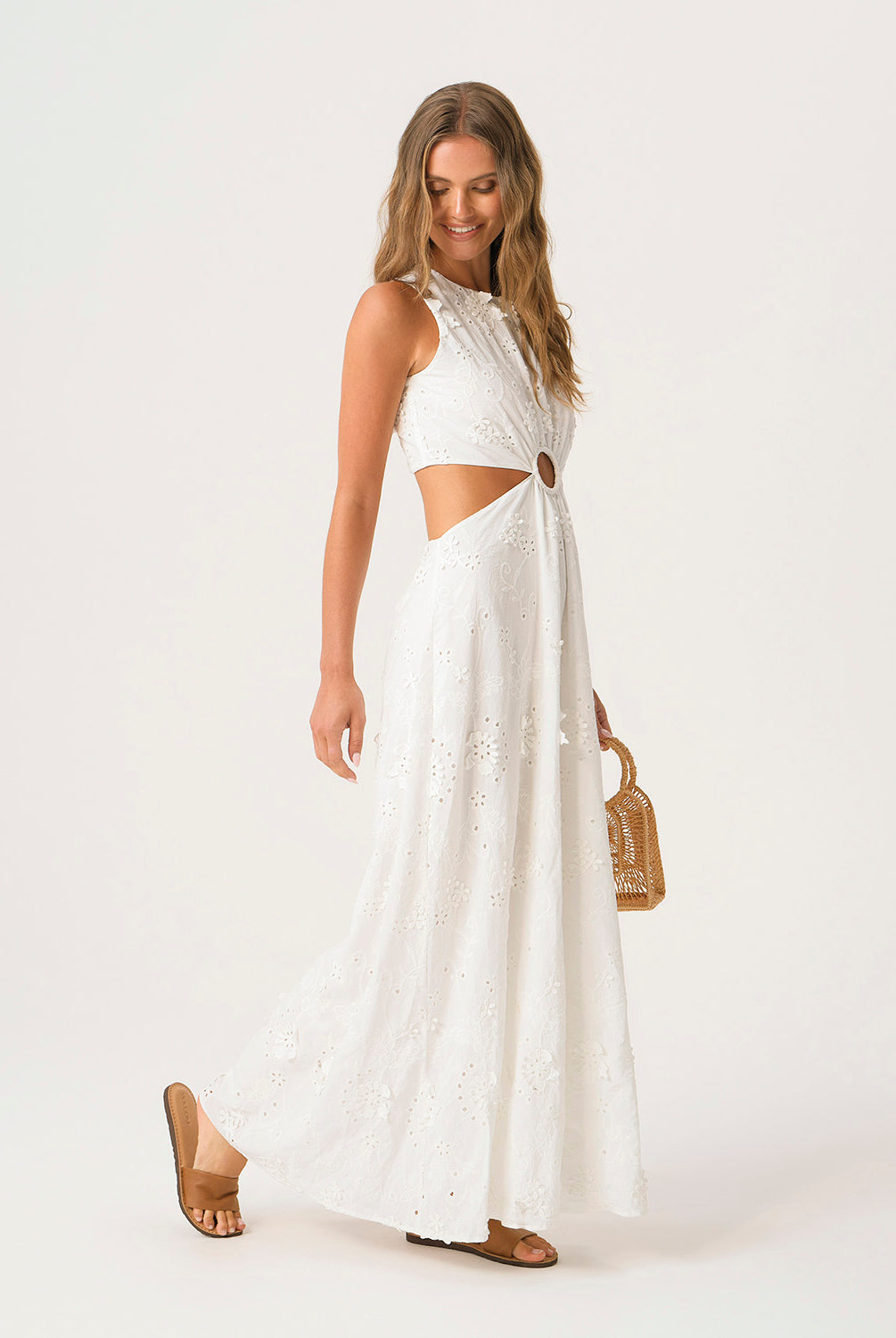 White Sands Tavi Dress in textured white eyelet fabric with center cutout and full-length feminine silhouette