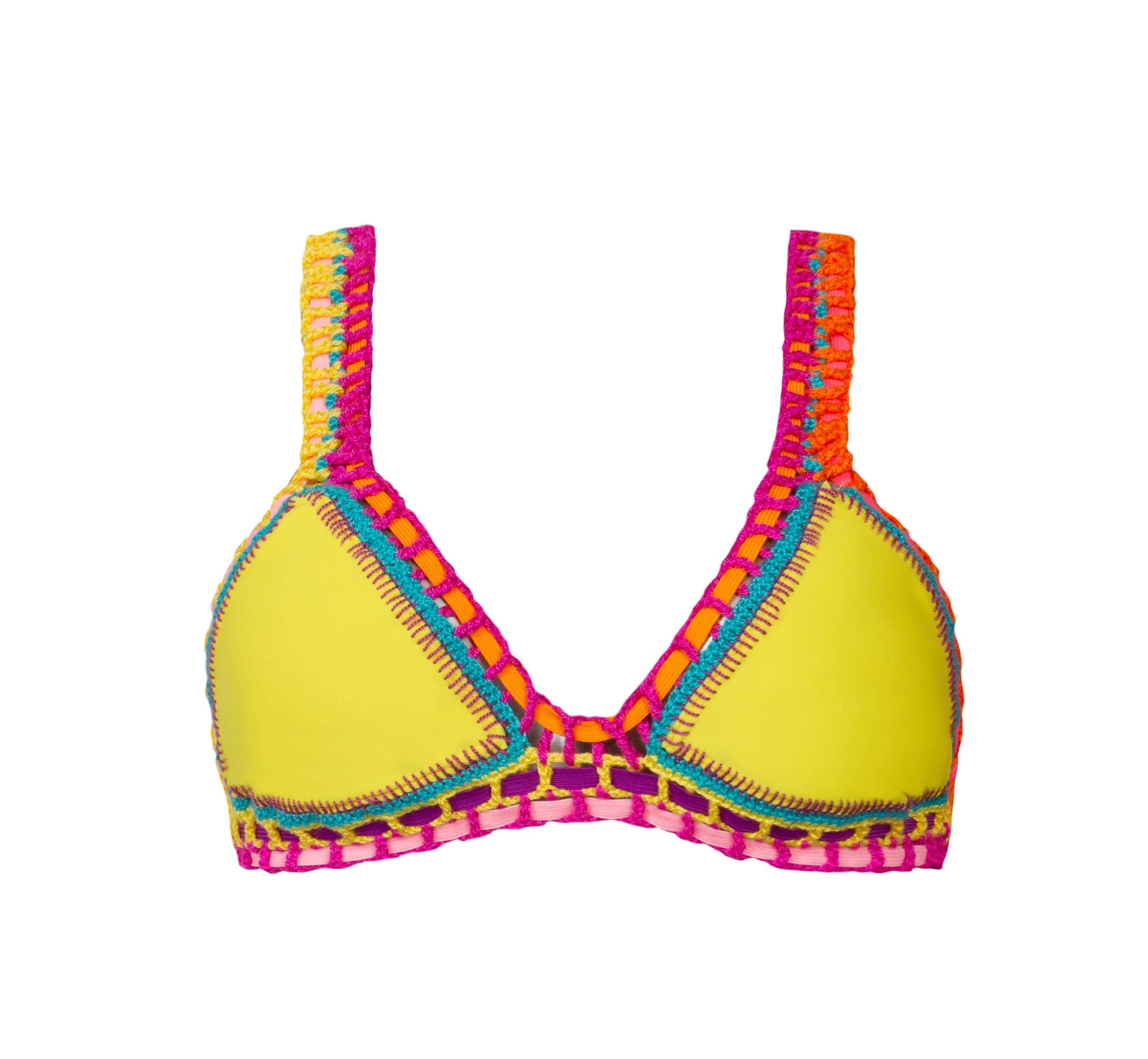 A yellow bikini top against a white wall.