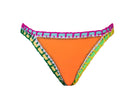 An orange bikini bottom against a white wall.