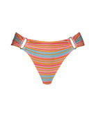 A striped high waist bikini bottom against a white wall. 