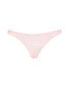 A light pink bikini with a white checkered print against a white wall.