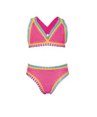 Pink bikini set with colorful trim on a white background