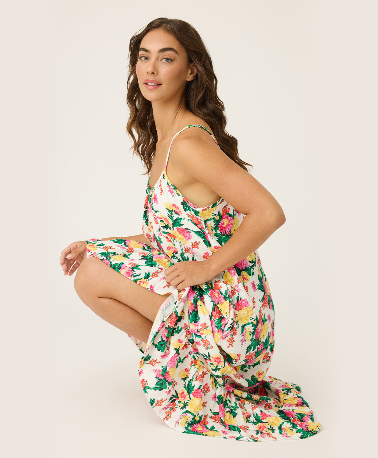 Dahlia Dress – Tropical Floral Sleep Dress in vibrant floral print, lightweight and airy with delicate straps and a softly flounced hem, styled for relaxed mornings or lounging at home.