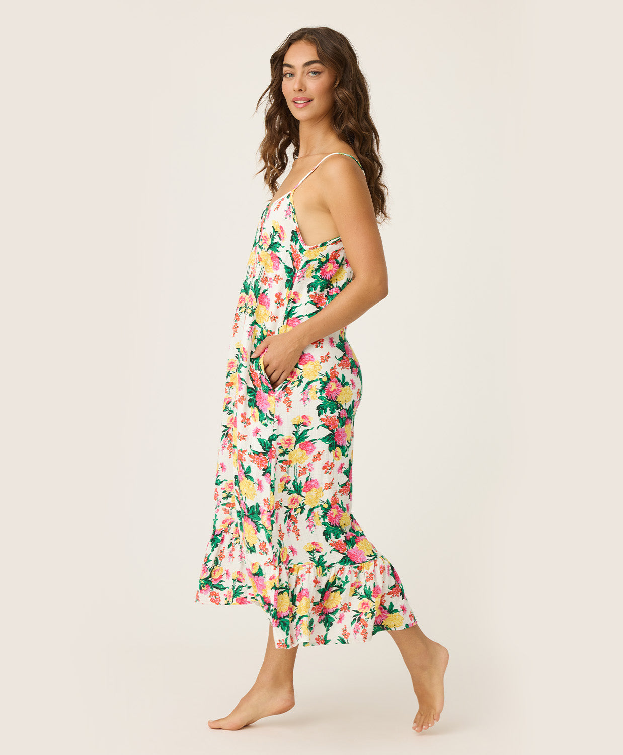Dahlia Dress – Tropical Floral Sleep Dress in vibrant floral print, lightweight and airy with delicate straps and a softly flounced hem, styled for relaxed mornings or lounging at home.