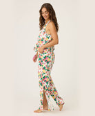 Woman wearing a floral dress with a white background
