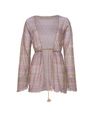 Sheer patterned top on a white background