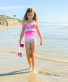 Kids Dreamy Sadie Rainbow Embroidered One Piece featuring colorful tie-dye design and exposed elastic detailing inspired by Solange Ferrarini.