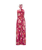 A sleeveless halter-neck maxi dress with a vibrant magenta floral print, featuring pink, white, and yellow flowers with green leaves, shown against a plain white background.