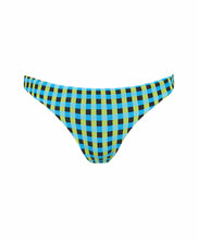 A blue and green checkered bikini bottom in front of a white wall. 