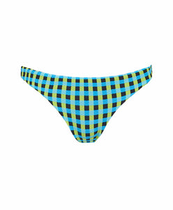A blue and green checkered bikini bottom in front of a white wall. 