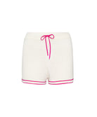 White shorts with pink trim and bow on a white background
