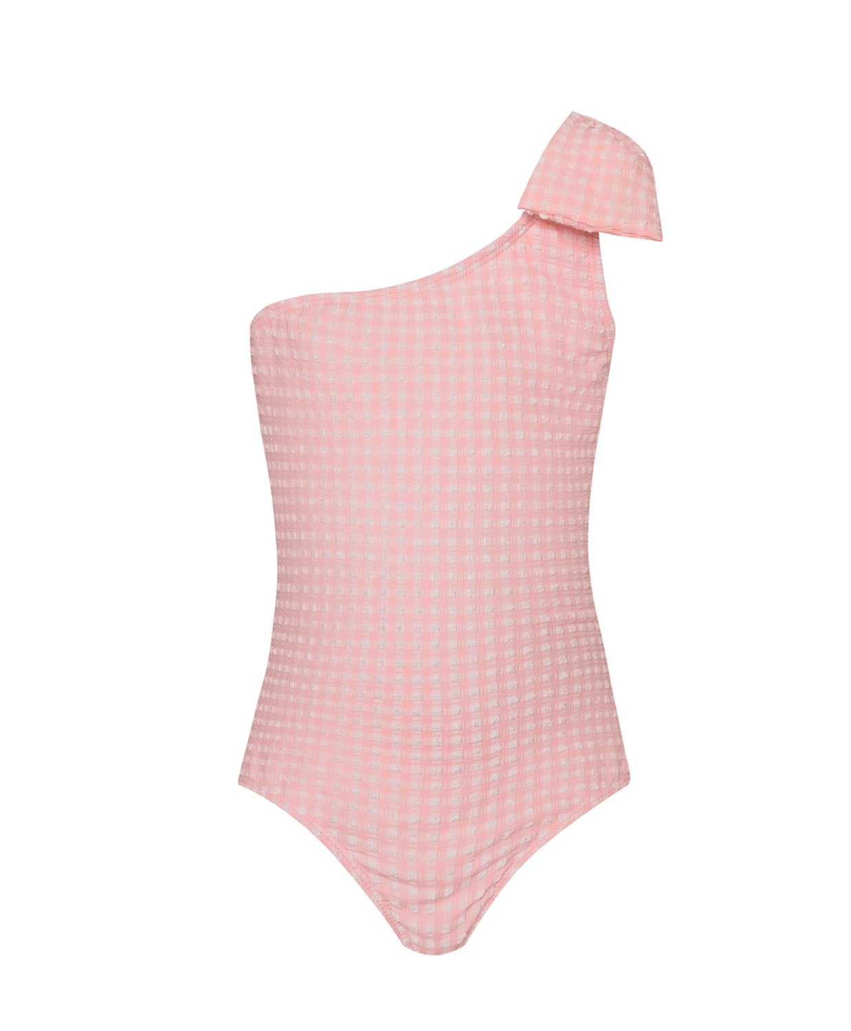 A light pink one piece with a bow against a white wall. 