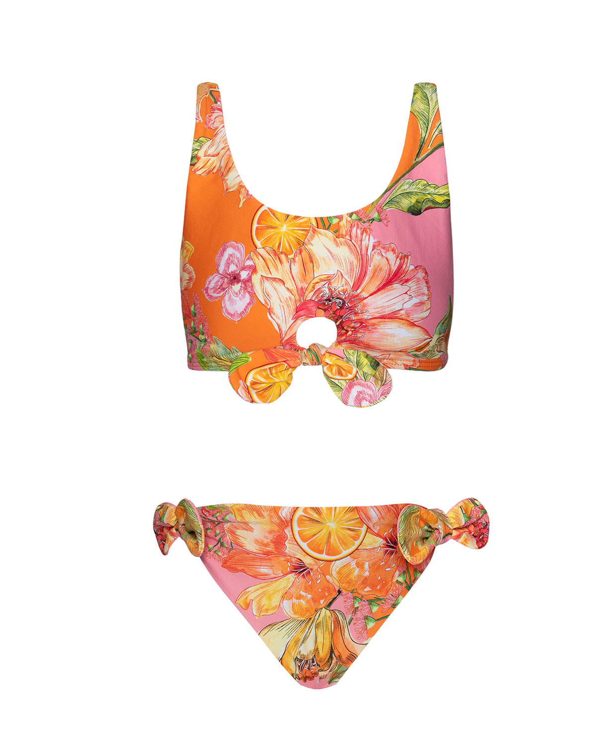 A pink and orange bikini with a floral print against a white wall. 