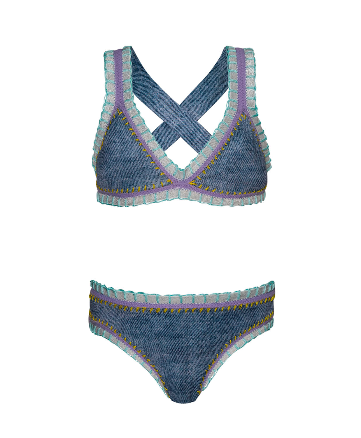 A denim kids bikini with colorful embroidery against a white wall.  