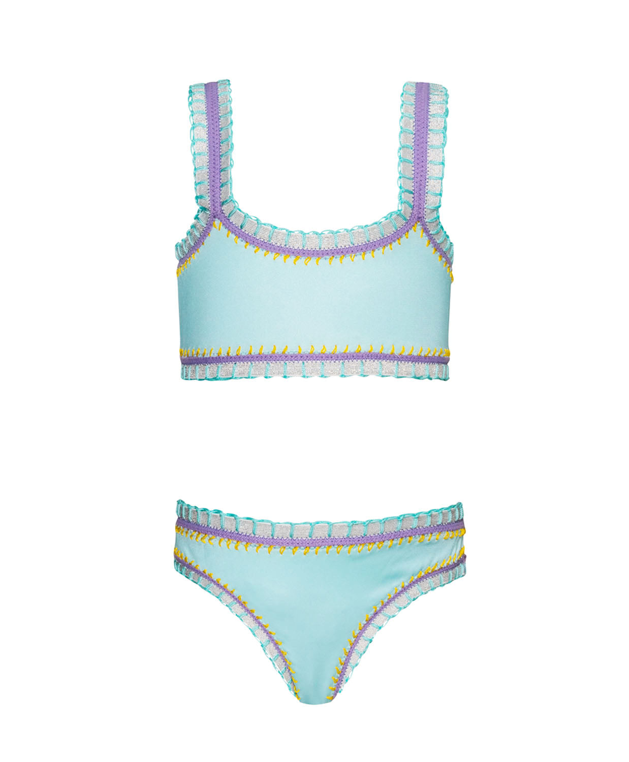 A light blue kids bikini with colorful embroidery against a white wall. 