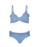 A blue and white striped kids bikini against a white wall. 