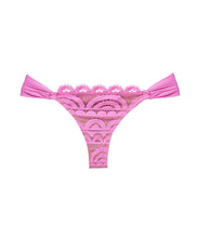 A violet lace fanned bikini bottom. Featured against a white wall background.