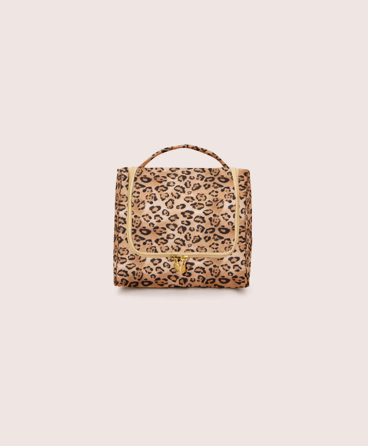 Leopard print toiletry bag on a beige background