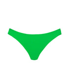 A green bikini bottom against a white wall.