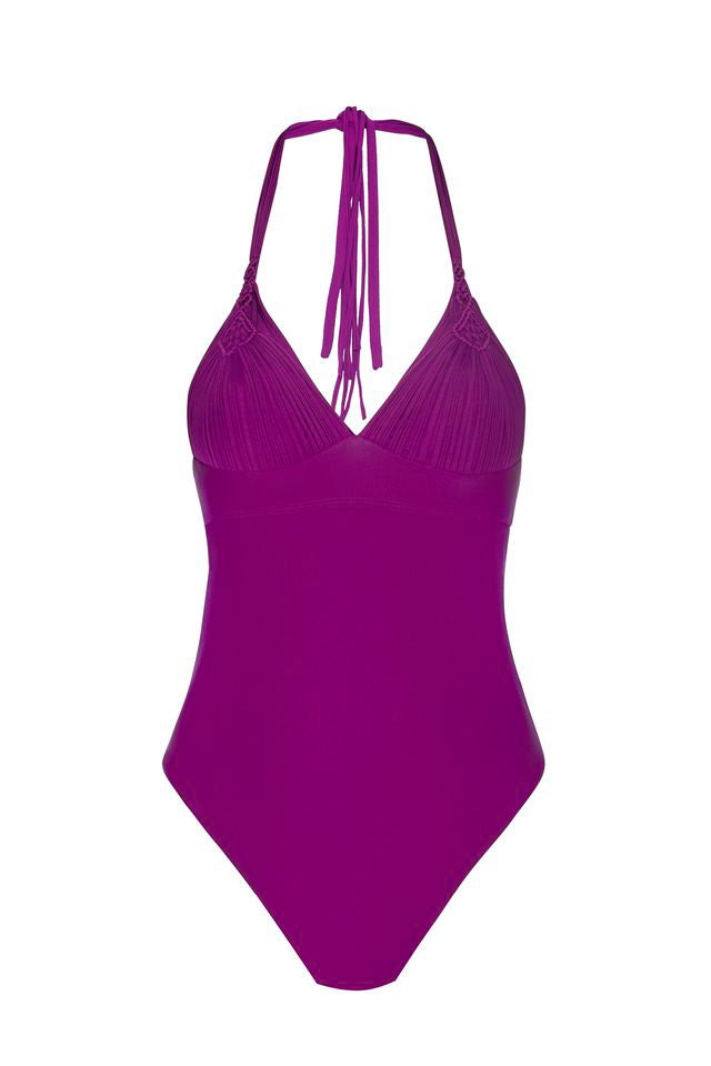 A bright magenta one-piece swimsuit with a halter neck and tie-back straps, featuring a textured, pleated cup design, shown against a plain white background.