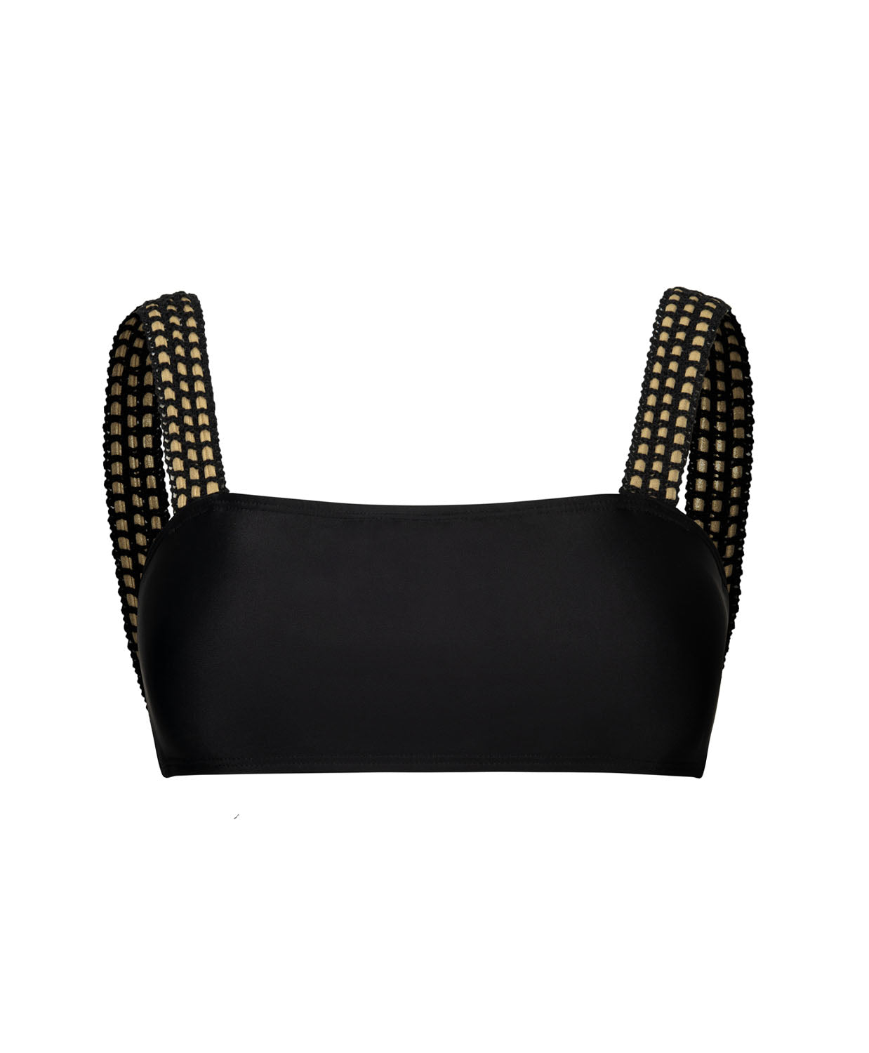 A black bikini top with gold details against a white wall. 