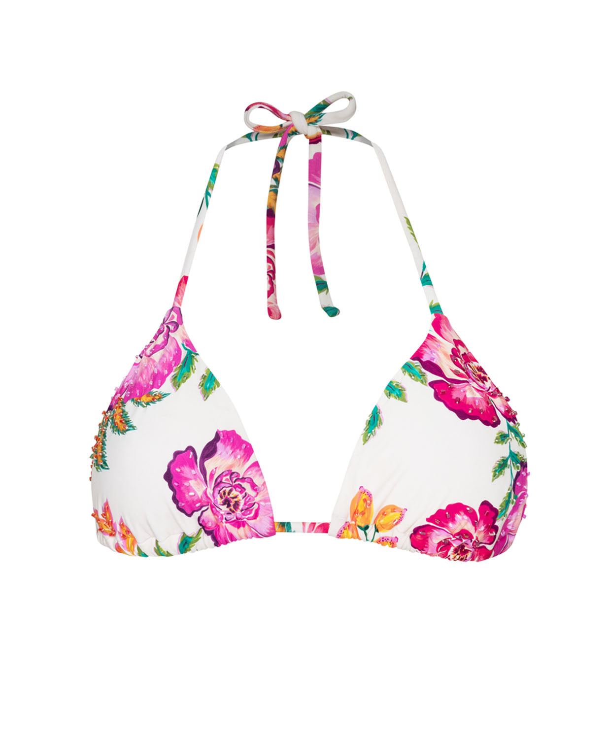 A white bikini triangle top with floral details against a white wall.