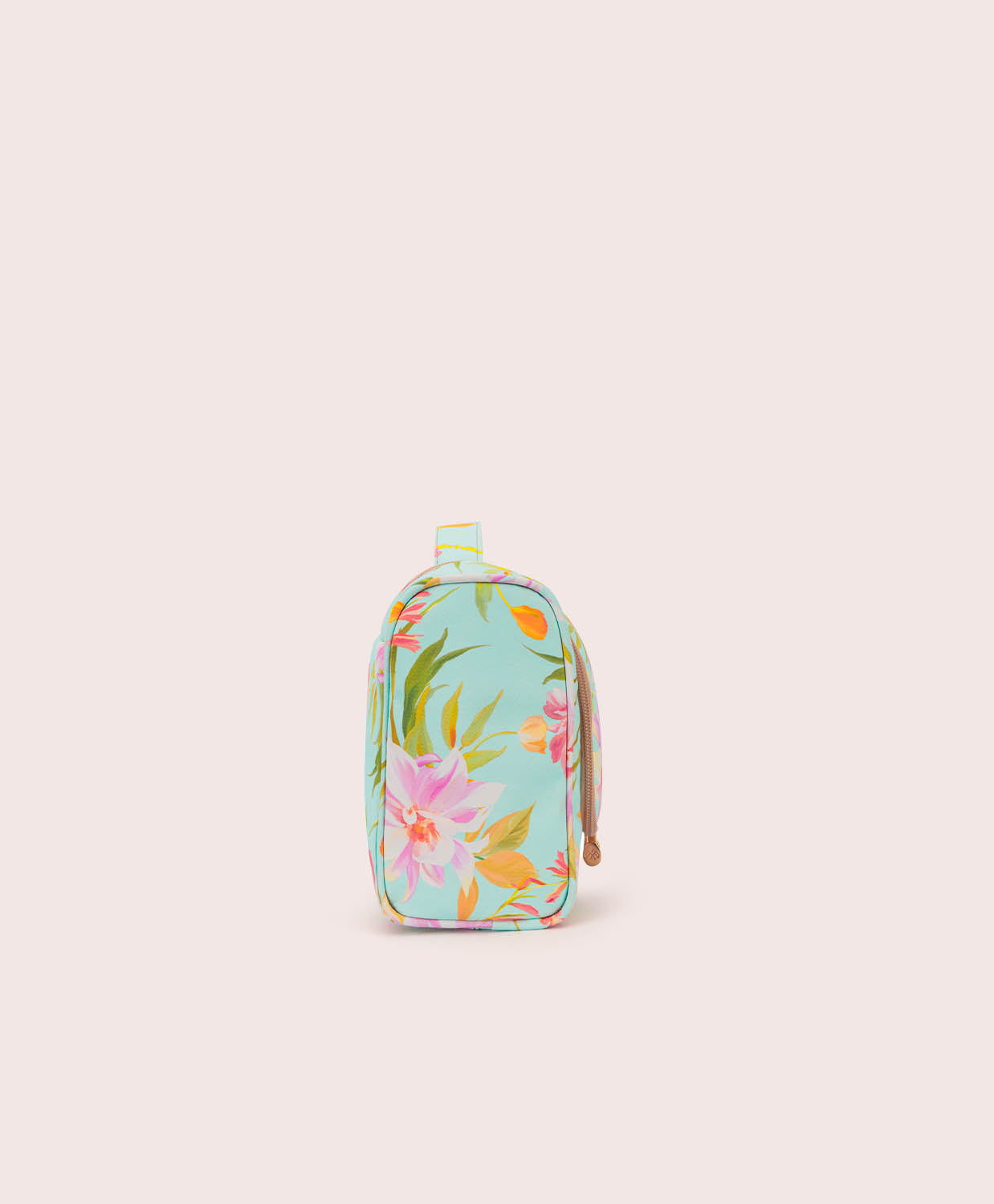 Floral-patterned toiletry bag on a light beige background