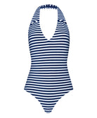 A blue and white striped one piece swim suit against a white wall.
