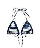 Navy and white striped bikini top with decorative straps on a white background