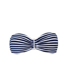 A blue and white striped bandeau bikini top against a white wall.