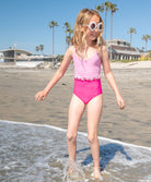 Kids Rosy Cammy Loop One Piece swimsuit with hot pink and baby pink color blocking, sporty razorback, and braided loop detail.