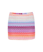 Sunkissed Reese Skirt in multicolor shimmering chevron print mini skirt with bold, playful resort style.