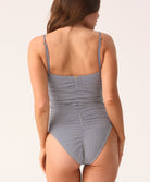 Blue and white striped one-piece swimsuit with seersucker texture