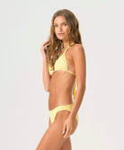 Buttercup Isla Triangle Top with handwoven macramé detailing in soft butter yellow for a secure, flattering fit.