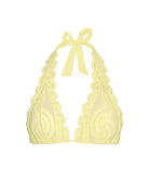 Buttercup Lace Halter Top in pastel yellow with hand-cut lace detailing and adjustable neck tie.