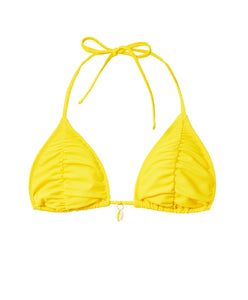 A yellow ruched triangle bikini top. Featured against a white wall background.