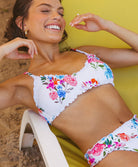 Florencia Smocked Lettuce Edge Bralette Top featuring a scoop neckline, vibrant floral smocked fabric