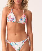 Florencia Smocked Tie Side Bikini Bottom in a vibrant floral pattern, featuring soft smocked fabric