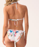 Florencia Smocked Tie Side Bikini Bottom in a vibrant floral pattern, featuring soft smocked fabric