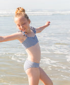 Kids Anchor Flutter Bikini with navy-and-white seersucker stripes and ruffled straps.