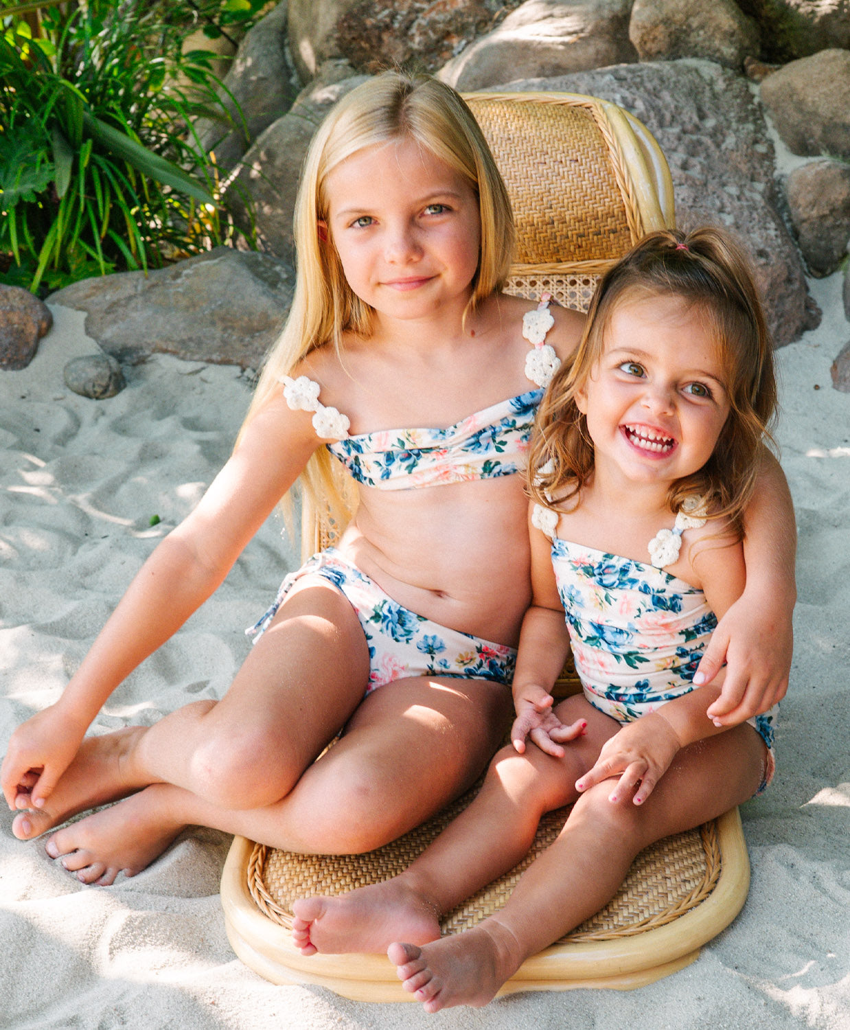 Kids Blossom Winnie Flower One Piece swimsuit with playful floral print and crochet flower straps for sunny adventures.