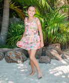 Kids Paradise Bloom Lucy Ruffle Skirt Set with tropical floral crochet fabric, playful ruffle skirt, and adjustable tie top for sunny adventures.