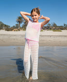 Kids White Chloe Set – a playful white crochet outfit with pink accents and a drawstring waist, perfect for sunny adventures.