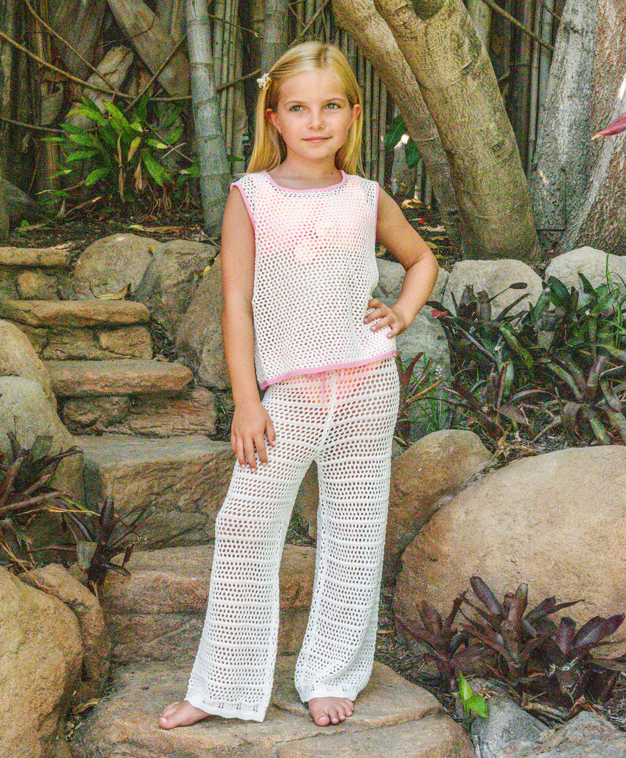 Kids White Chloe Set crochet outfit with pink accents and adjustable drawstring pants, perfect for sunny day adventures.