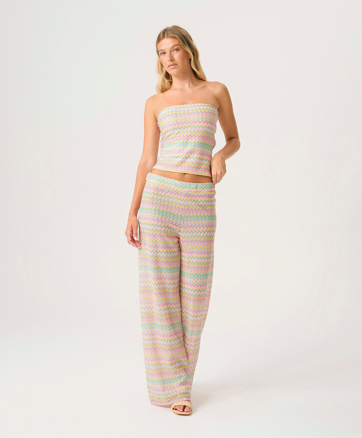 Love Spell Elle Strapless Top with shimmering pastel multicolor chevron print in a classic strapless silhouette.